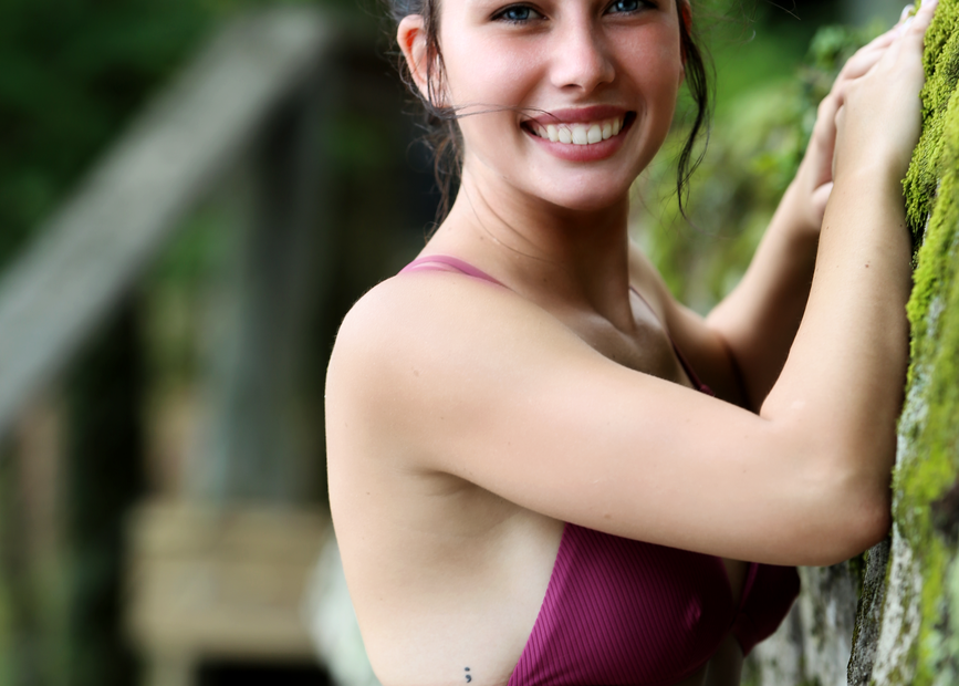 Woman in a bikini by the water