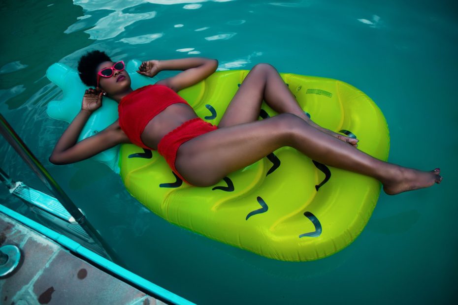 Woman in a bikini by the water