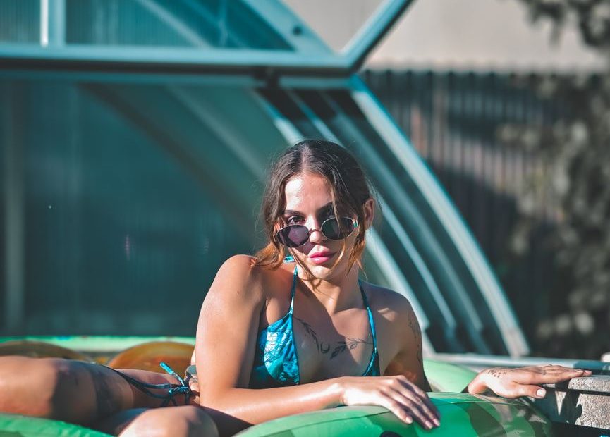 Woman in a bikini by the water